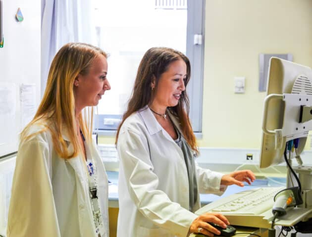 A student shadowing a doctor.
