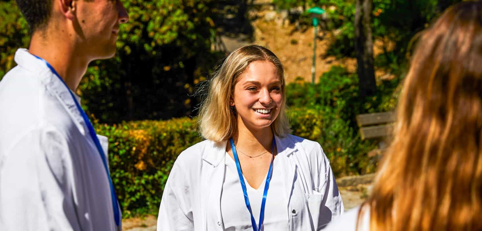 An Atlantis student smiling outside of the hospital.