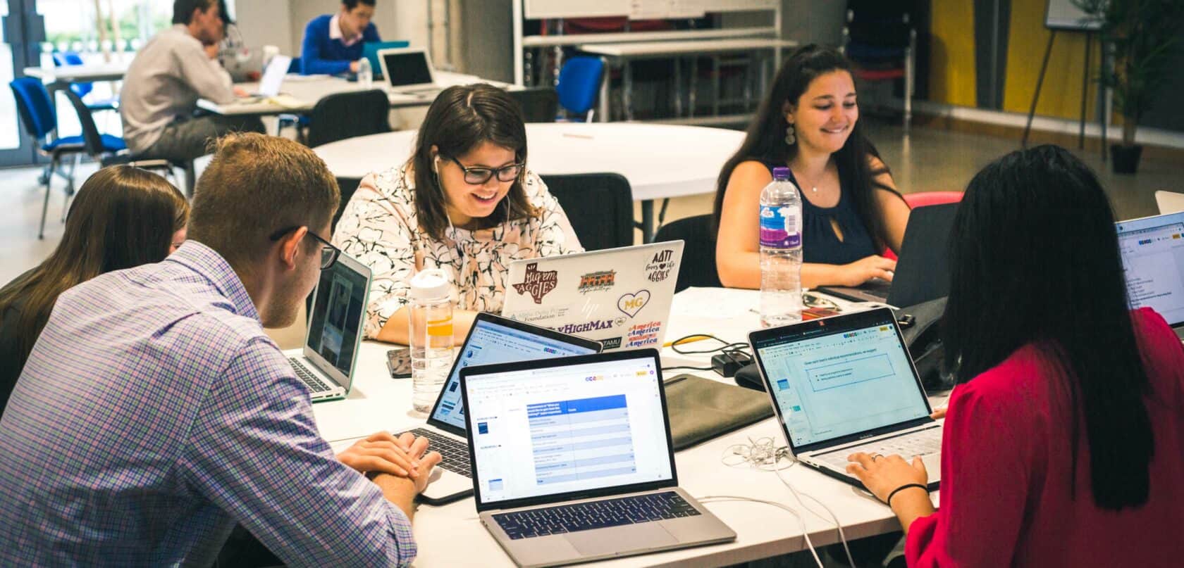 Students working on their presentations for their internships.